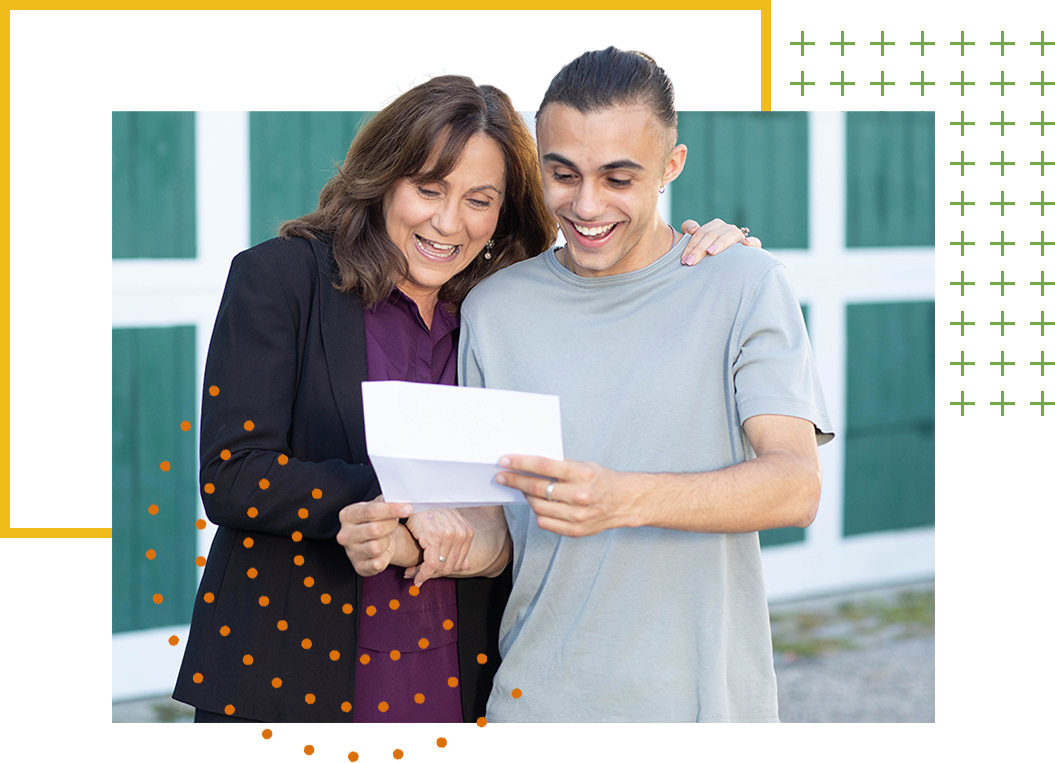 Mom and son reading college acceptance letter
