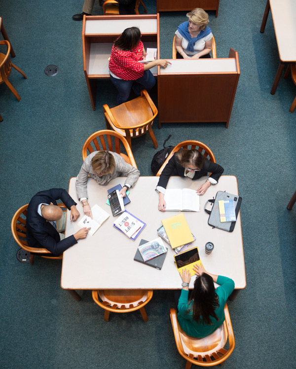 Students studying in library